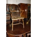 A 19th Century elm and beech hoop back armchair together with a wheelback windsor armchair