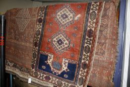 A group of Middle Eastern rugs -7