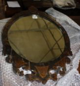 A 19th Century Continental painted oval wall mirror 64cm high, and a George II style mahogany