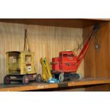 A Sutcliffe toy crane, Tri-Ang crane and a Dinky Elevator Loader.Best Bid