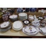 A Limoges porcelain part dinner service, floral decorated, Copeland plates and comport, blue and