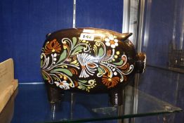 A pottery pig money box, 19cm highBest Bid
