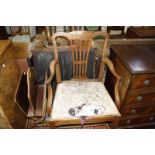 A reproduction hi-fi cabinet, a penwork decorated magazine rack and a George III mahogany armchair