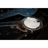 The Windsor five string banjo "The Whirle" in fitted case with tuning pipes