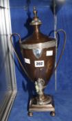 A Regency copper tea urn of twin handled vase form, silver mounted shield, London (marks worn)