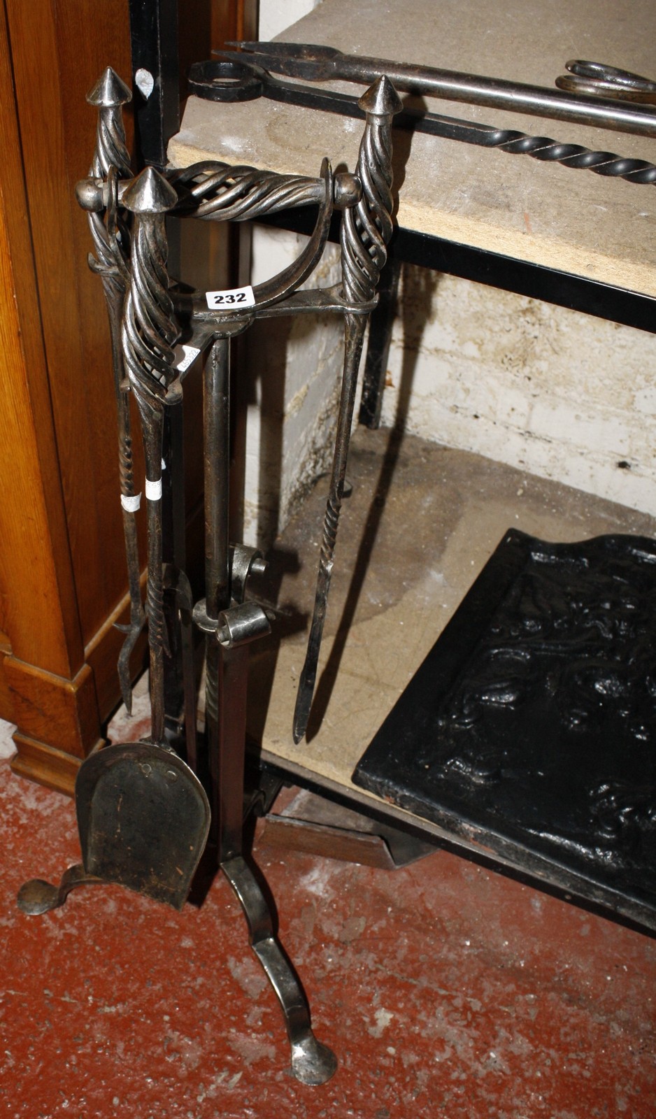 A steel fire iron companion stand and beech bellows