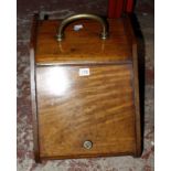 A mahogany coal box, with brass handle