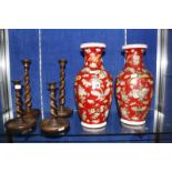 A pair of 20th Century Oriental vases, red ground decorated with butterflies, baluster shaped,