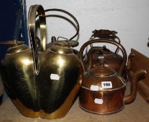 A copper kettle, two others and an Italian heart shaped compartmental flask