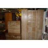 A Waring and Gillow three piece bedroom suite Patent No 224089 consisting of a wardrobe, chest of