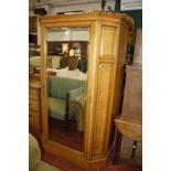 A Victorian oak and ash wardrobe and a Victorian oak and ash dressing table.