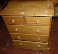 A small pine chest of drawers