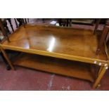 A modern yew rectangular two tier occasional table 50cm high, the top 120cm x 60cm and a mahogany