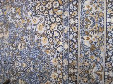 A machine made carpet, in Tabriz style 260 x 380cm approxBest Bid