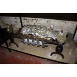 A cast and wrought iron dog grate with armorial and initial 'S' to andirons 100cm length