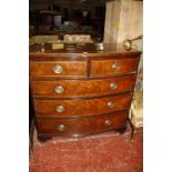 A Georgian chest of drawers of two short and three long drawers, with boxwood stringing and