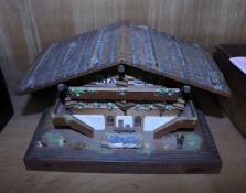 A 19th Century music box, a chalet style music box and other parts in wooden box