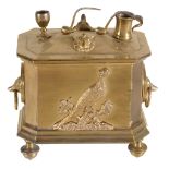 A rectangular gilt brass tobacco box,   late 19th century, applied with pipes, a tankard and goblet