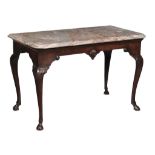 A George II mahogany side table  , circa 1750, possibly Irish, the shaped marble top above moulding