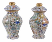 Two similar decalcomania glass baluster vases and covers  , second half 19th century,  the