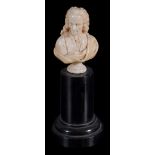 An ivory bust of Voltaire,   early 19th century,  on ebonised plinth , 7.5cm high