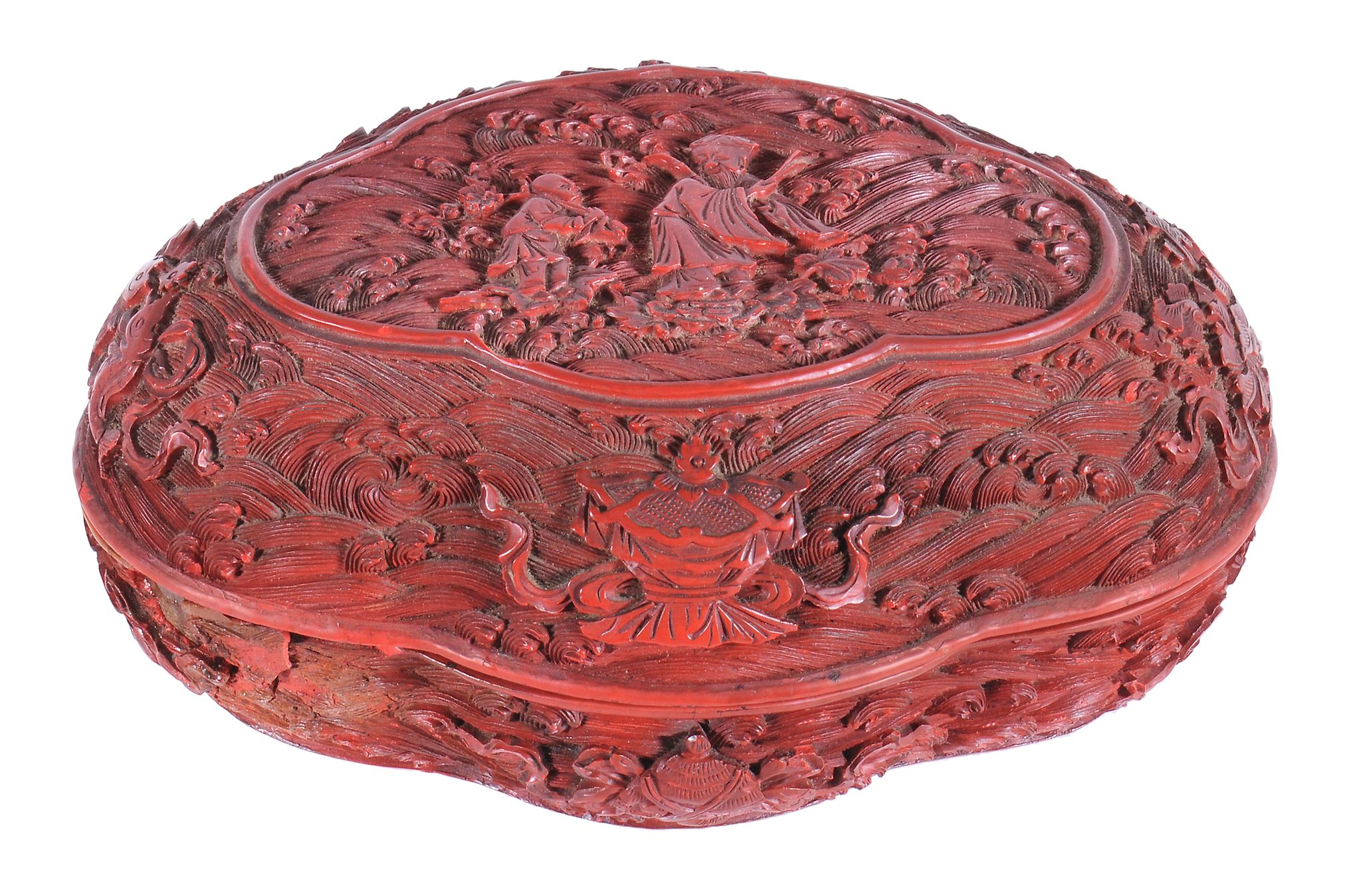 A Chinese cinnabar lacquer box and cover of ruyi head form, Qing Dynasty, 19th century,  carved with