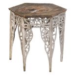 A hexagonal painted beech table in Gothic style,   first quater 19th century and later,  the oak