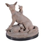 A Continental terracotta model of a vixen with cubs,   late 19th century, on a slate base, 15cm