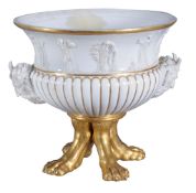 A Paris porcelain jardiniere  , circa 1820,  the upper part moulded with white bisque classical