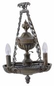A Regency bronze twin light colza oil hanging lamp, circa 1815, with fluted urn reservoir above a