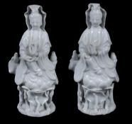 A pair of small Dehua figures of Guanyin  , Qing Dynasty, 18th century,  seated on lotus pedestals,