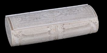 An Anglo-Indian carved ivory oval-section box,   late 19th century,  with a hinged cover,