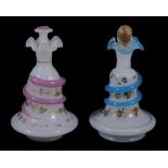 A pair of opaline glass scent bottles and stoppers  , circa 1870, 16cm high Please see image on our