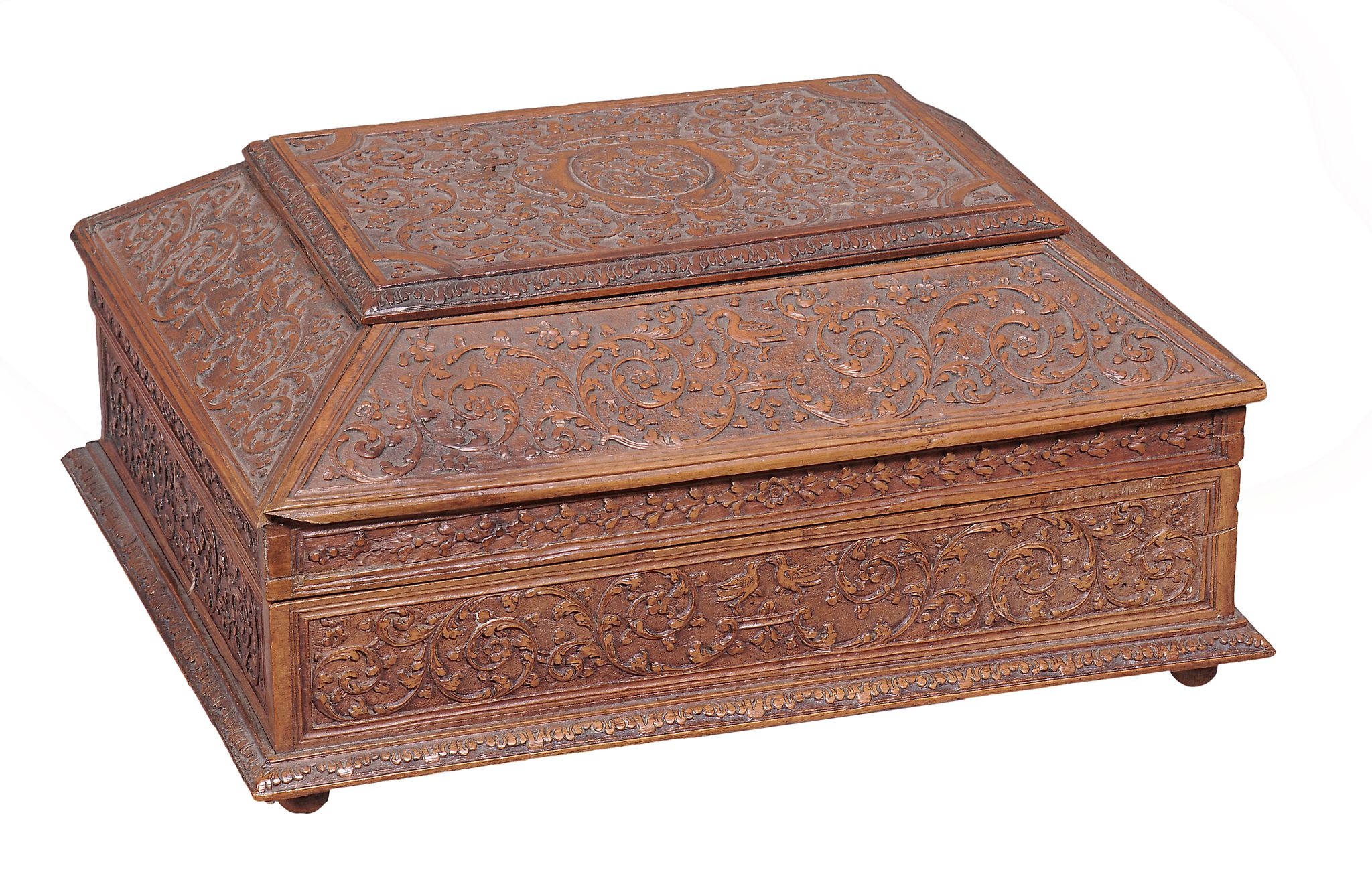 A French walnut casket, in the style of Bagard of Nancy  ,  carved all-over with Renaissance flower