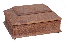 A French walnut casket, in the style of Bagard of Nancy  ,  carved all-over with Renaissance flower