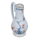 A Chinese jug  ,  with loop handle, decorated in Holland with the kakiemon Bengal Tiger pattern and