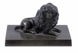 A French bronze model of a poodle, circa 1840, portrayed recumbent  on a rectangular base,  5cm
