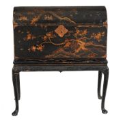 An Anglo- Chinese black lacquer and gilt decorated chest on stand  , the chest circa 1700,  with