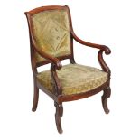 A Charles X mahogany fauteuil  , circa 1830,  with an arched padded back, scroll arm supports and