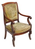 A Charles X mahogany fauteuil  , circa 1830,  with an arched padded back, scroll arm supports and