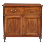 A Regency mahogany and crossbanded secretaire cabinet  , first quater 19th century, the shaped top