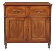 A Regency mahogany and crossbanded secretaire cabinet  , first quater 19th century, the shaped top