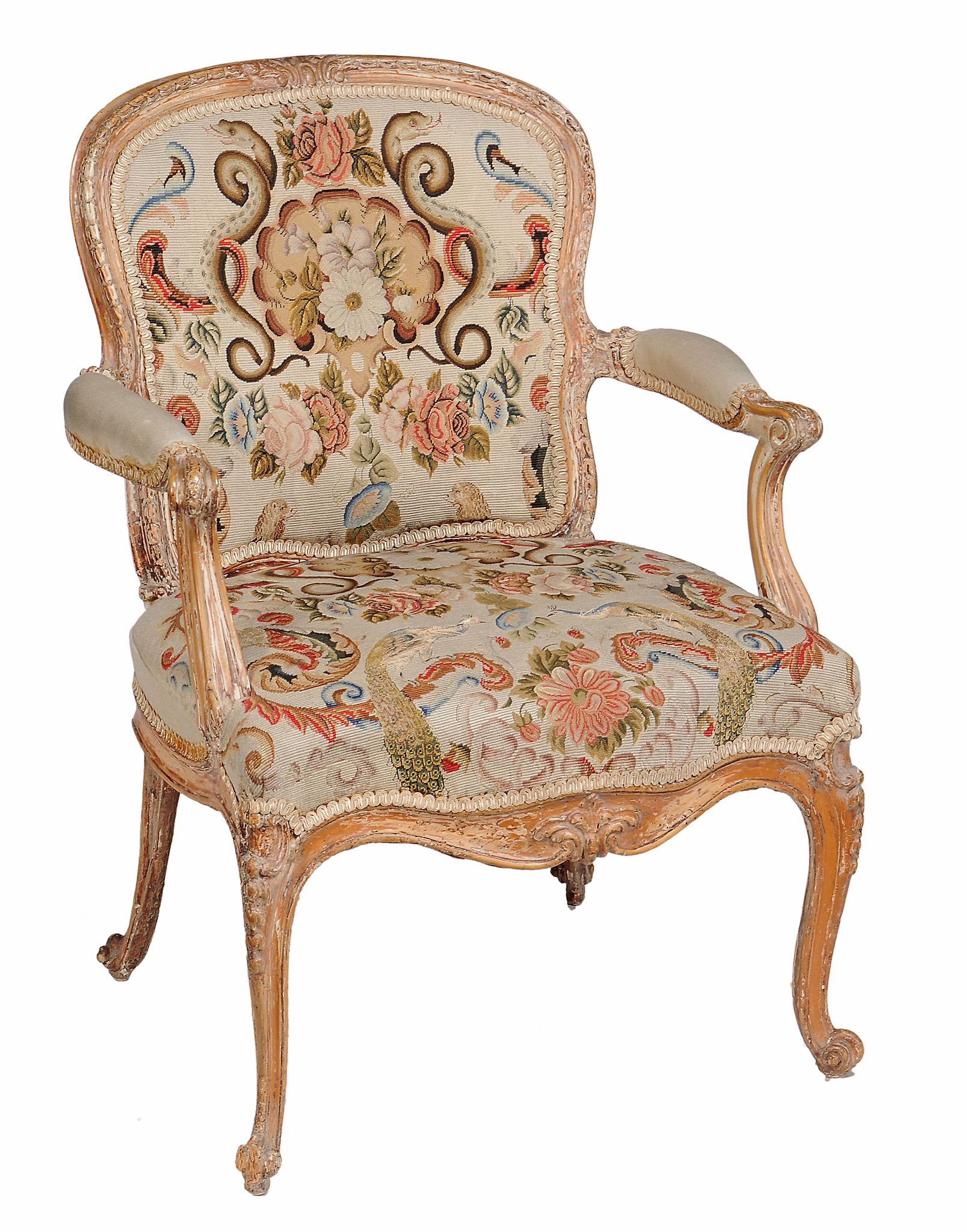 A George III armchair  , circa 1770, in the manner of Linnell,  the cartouche shaped back, seat and