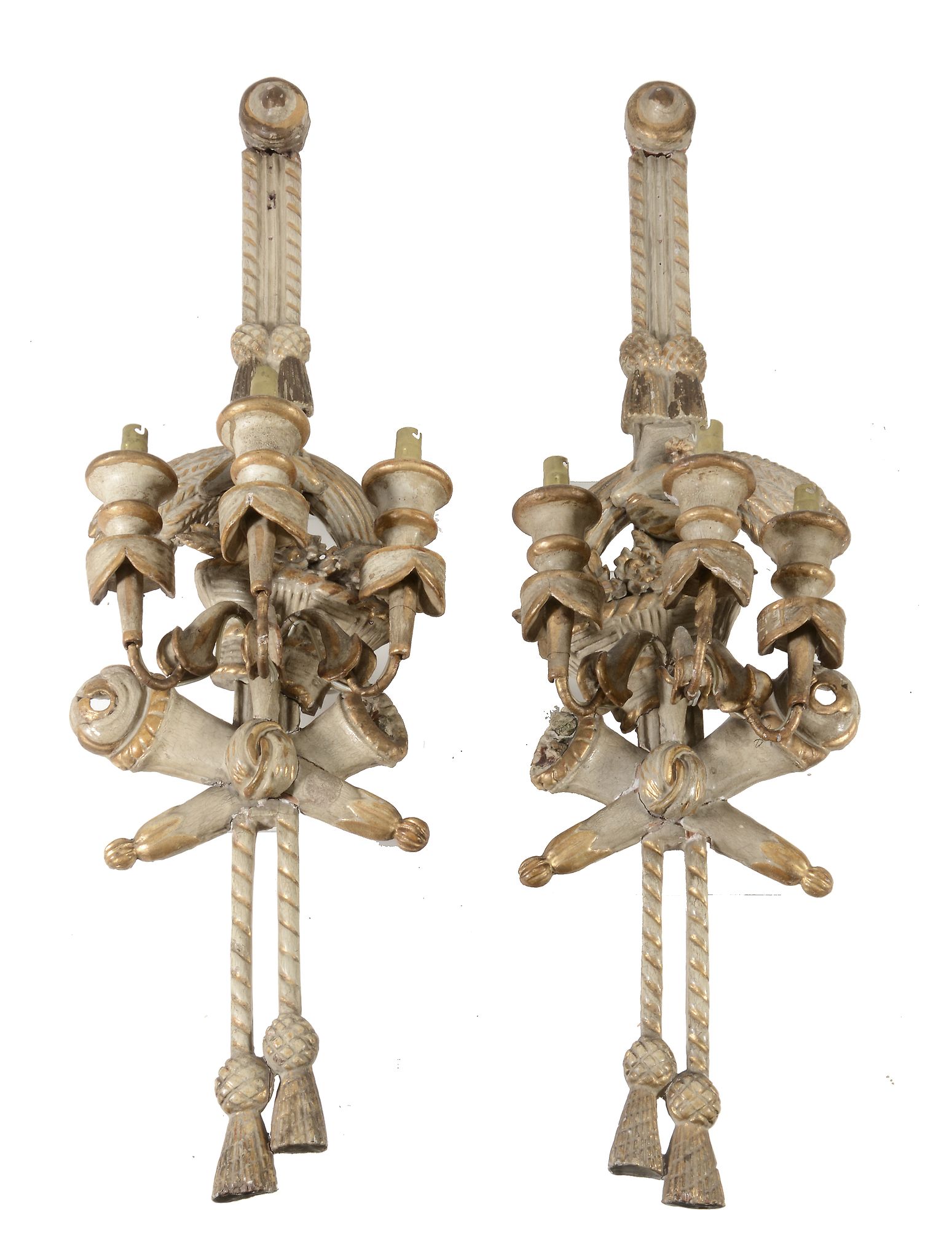 A pair of white painted and giltwood three branch wall appliques  , possibly Baltic, in Louis XVI