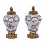 A pair of small French porcelain vases  , late 19th century,  decorated in the SÃ¨vres style with
