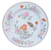 A Chinese famille rose circular dish  , Qing Dynasty, Qianlong (1736-95), the centre with a bird