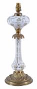 A Victorian white flashed glass and gilt mounted oil-lamp,   last quarter 19th century, fitted for