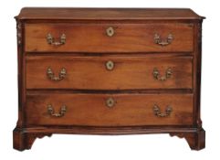 A George III mahogany serpentine fronted commode  , circa 1800, probably Channel Islands, with