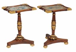 A pair of rosewood and parcel-gilt occasional tables  , circa 1825 and later, the glazed shaped