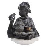 A bronze figure of a woman  , French, 19th century,  the half length figure holding a tray with a